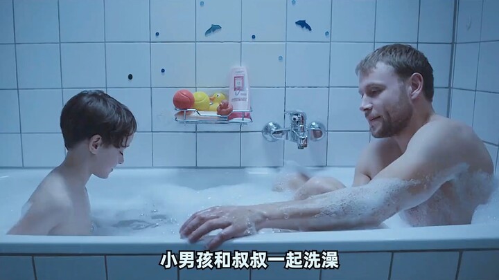 A little boy and a middle-aged man take a bath together. It looks so heartwarming on the surface—onl