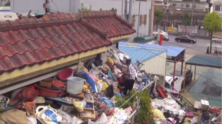 The world’s most shocking parasite: Their house is so cluttered with trash it blocks the front door!