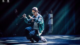 A hip-hop champion and rapper who works for a Fortune 500 company performs his own rap work.