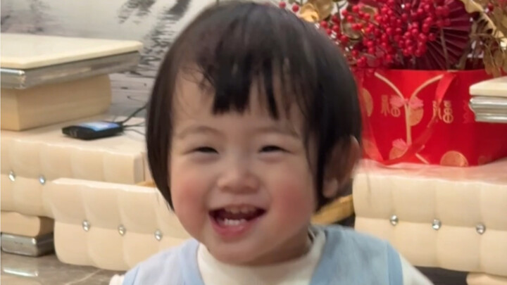 She seems to have fallen in love with her little belly…