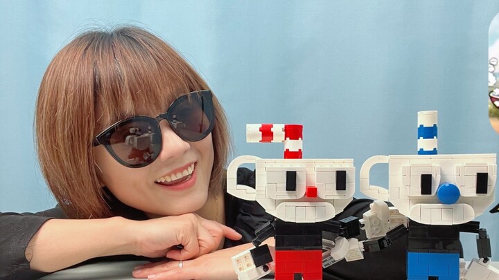 The building blocks restore the classic game character Cuphead, and the two brothers who build the c