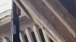 The commander is on the front line, shooting down the incoming drone with a shotgun