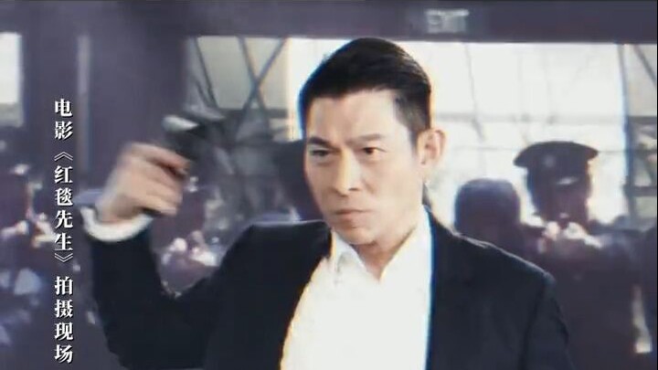 Andy Lau reenacts his iconic gun‑swinging scene, taking us back to the TVB Five Tigers of 33 years a