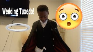 MY SON TRIES ON HIS TUXEDO.....