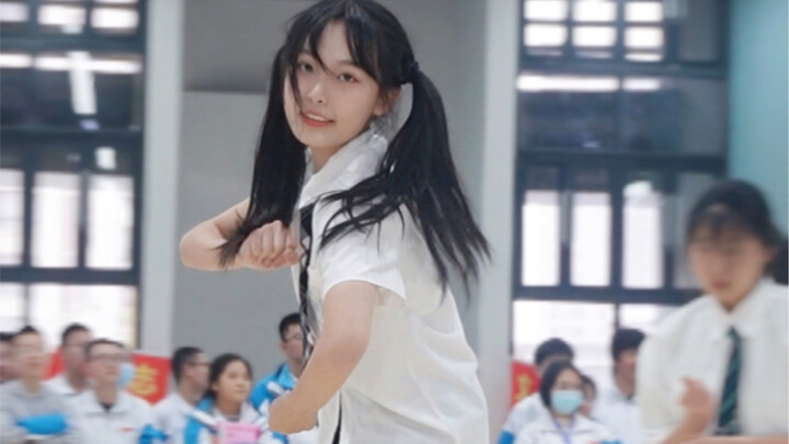 Who says girls with twin ponytails can't dance well in a male group dance! Watch the cheerleading te