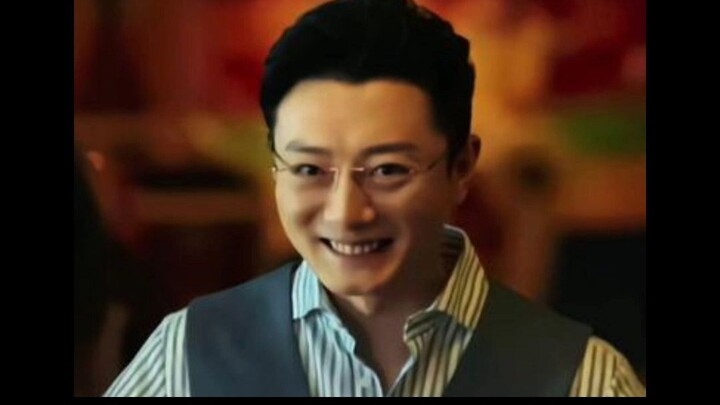 Showing a Thai girl the “sophisticated scoundrel” wearing gold-rimmed glasses