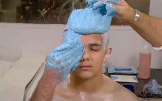 Covering my face with blue mud, I ended up looking so different even my own mom couldn't recognize m