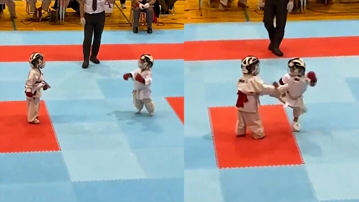 Trying to kill each other with c*ess? Two cute kids compete in Taekwondo, one of them jumps over 