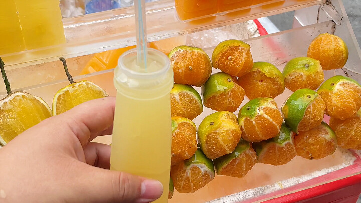 Thai cuisine: Hand-squeezed fresh orange and tangerine juice with a tangy, sweet taste and a refresh