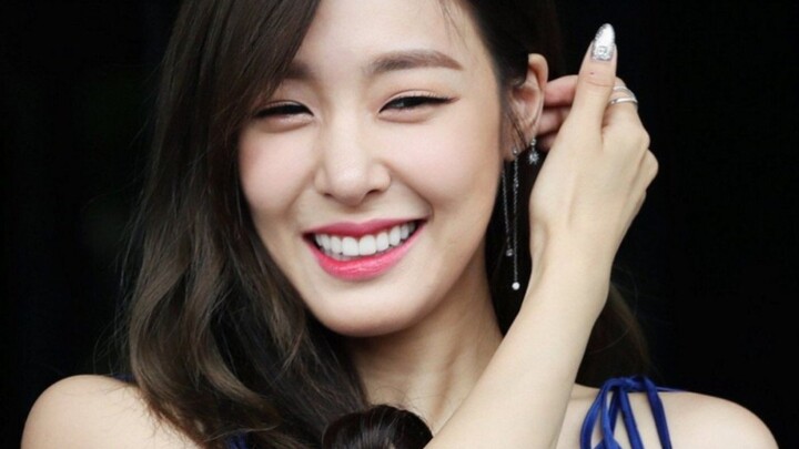 Her vibe might have changed, but those smiling eyes are still the same.