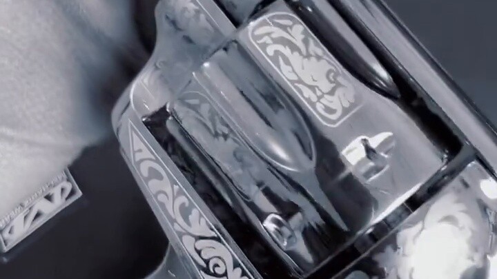 The engraved version of the Cute Tiger Red Dead Cowboy Revolver toy is a work of art