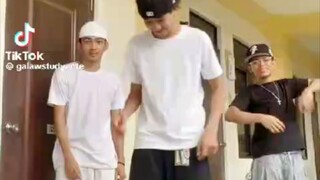 three boys dance