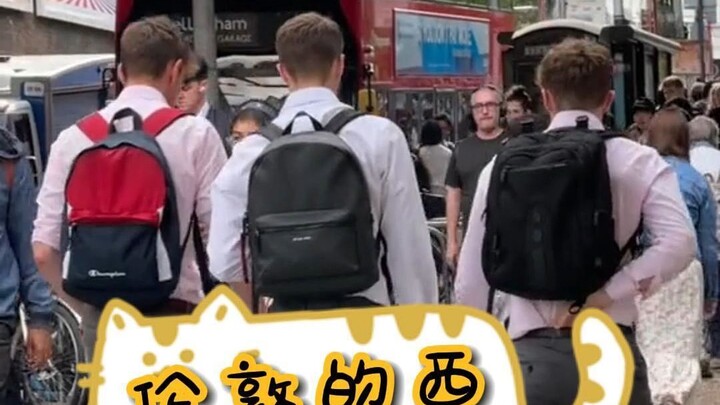 Trên đường phố Luân Đôn, đâu đâu cũng thấy những chàng trai mặc vest~