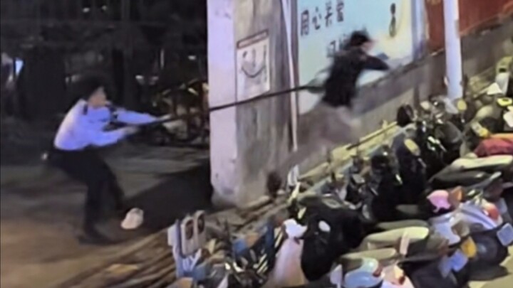 Police apprehend knife-wielding suspect at the scene