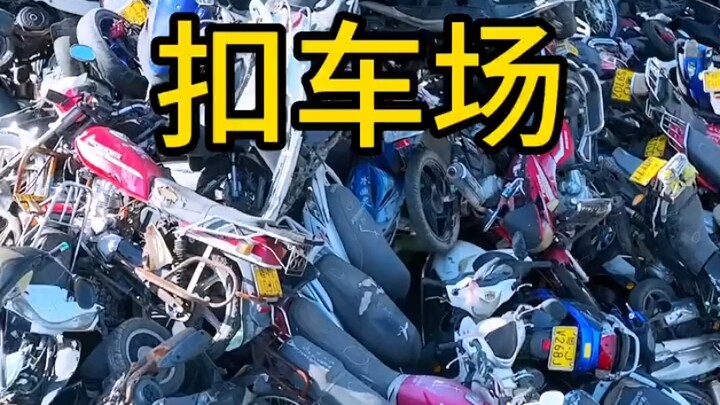 Tempat penampungan mobil di Zhongshan, Guangdong, dipenuhi tumpukan kendaraan yang menjulang tinggi,