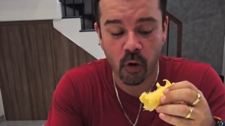 Foreigner trying Durian