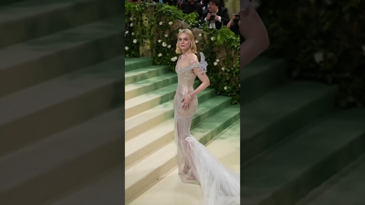 Our sleeping beauty. 🤍 #ElleFanning at the 2024 #MetGala. (🎥: Getty)