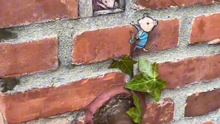 Nghệ sĩ đường phố David Zinn tung hoành khắp các ngõ phố, dùng phấn trắng vẽ nên những bức tranh ấm 