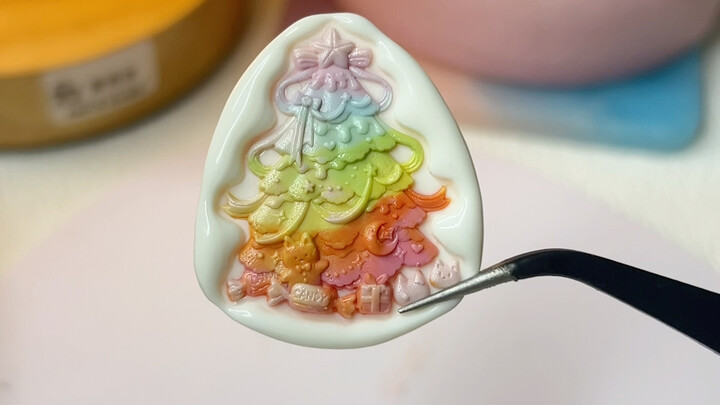 Using rainbow floating flowers to stamp Christmas designs looks pretty cool!