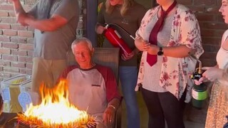 The 80th birthday cake the grandchildren prepared for grandpa... Seeing there's a fire extinguisher 