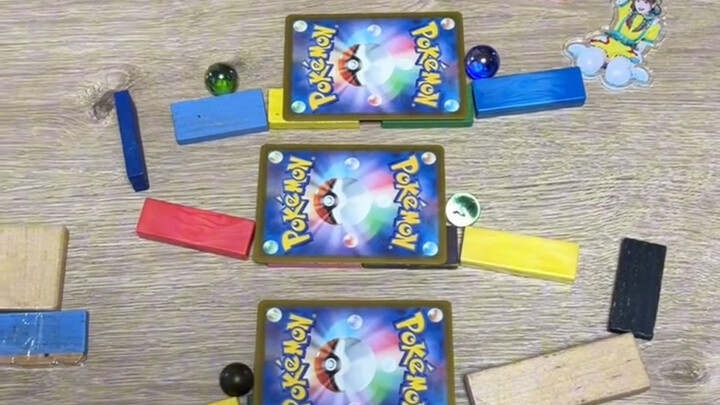The marble chain reaction on the tabletop.