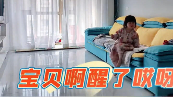 A 3-year-old comforts themselves while waiting for Mom after waking up.