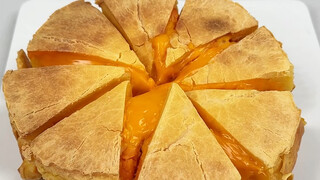 I once had this "cheesy sweet potato and rice cake" at a friend's place. Warm, cheesy sweet potatoes