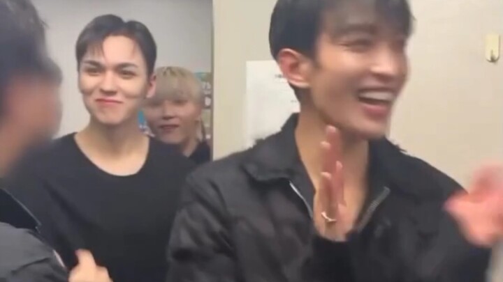 Staff members shouted “Seventeen!” as they greeted the young Seventeen members who had just won the 