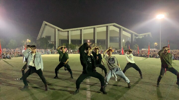 Boys cover ECO's "Love Shot" in the military training field