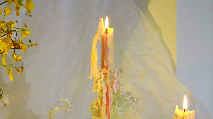 The crystal candlesticks made from broken glass paired with homemade scented candles are so beautifu