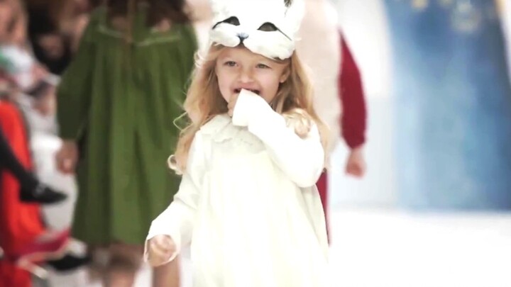 Those unbelievably adorable child models—now this is what a runway fairy looks like!