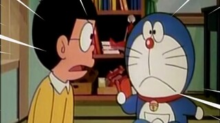 Nobita: Đôrêmon, chơi vui vẻ chút nhé!