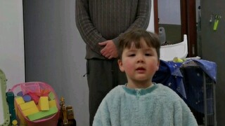The mixed-race baby was so angry that he sat down on the ground because his father stole his lines