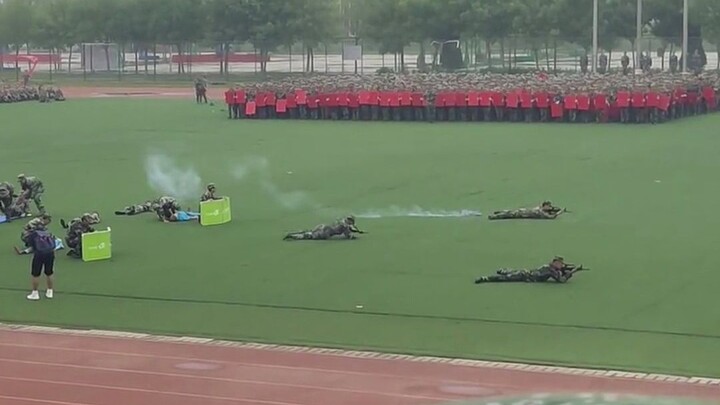 Teammate’s smoke grenade nails the target during military training exercise