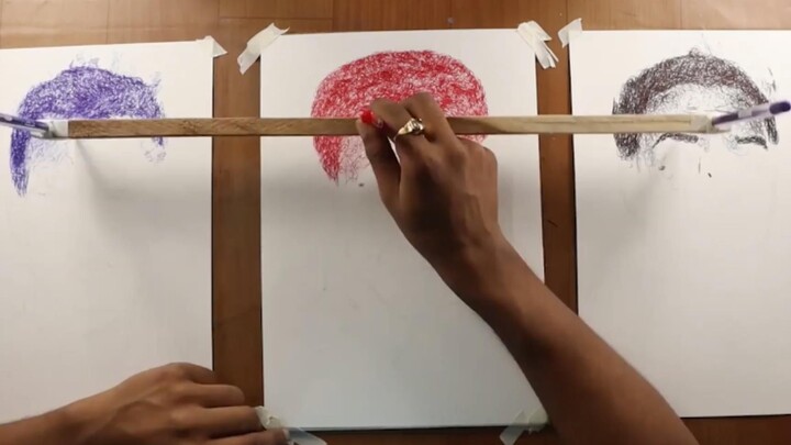 A pair of hands, three pens, a miracle