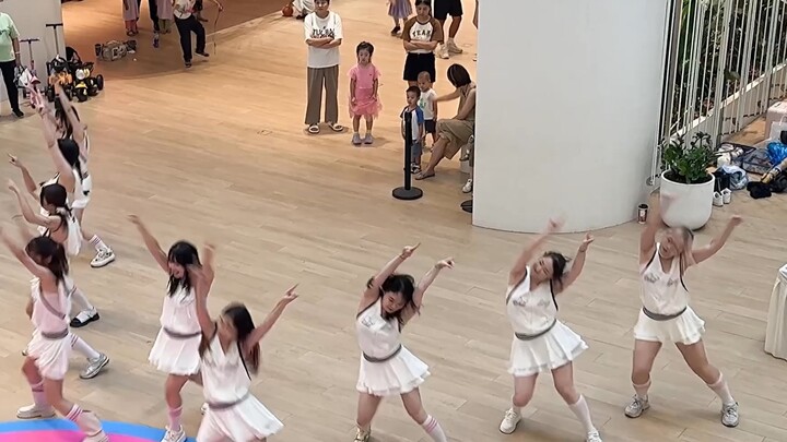 I passed by and there seemed to be a dance competition. They danced in unison. Can you tell which so