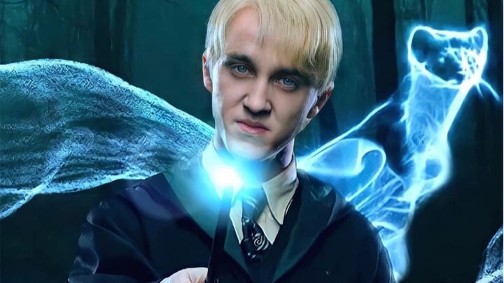 "Draco in the school robe and the Death Eater in the suit is Malfoy"