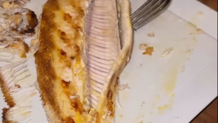 The chef personally removes fish bones.