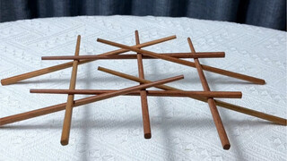 Use nine chopsticks to build a bridge. Try it at home with your children.
