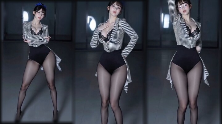 Arrogant hip swivels, black stockings and secretary outfit – vertical full-view