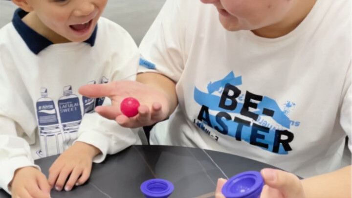 Where did the little ball go? Try this magical little magic trick at home with your kids—can you fig