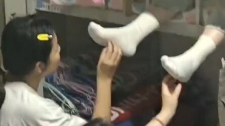 Is this how modern college girls pass the time in their dorms?