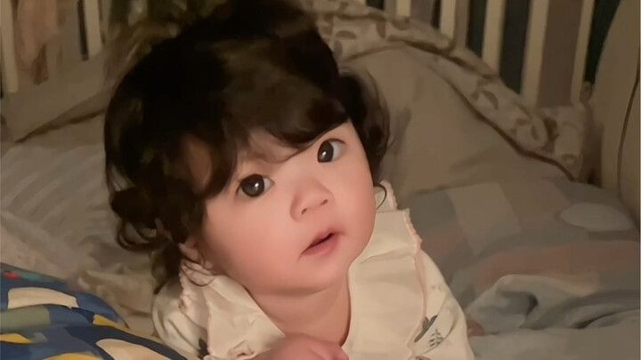 Brother is sick, and his 6-month-old sister “takes meticulous care” of him!