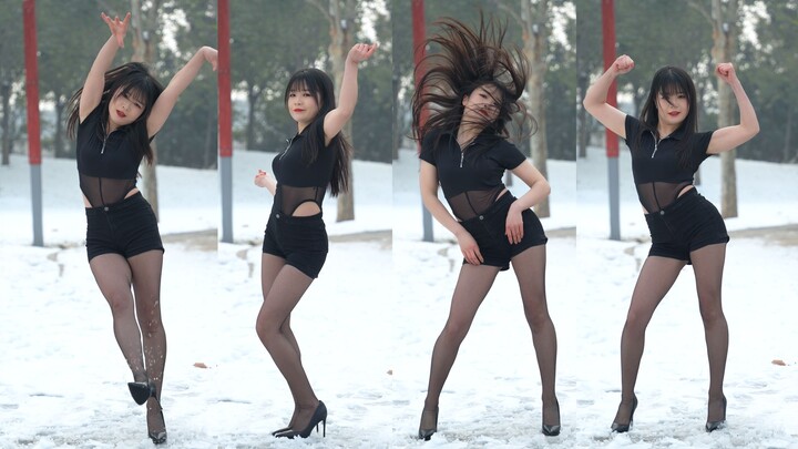 Dancing Super Lady in the snow wearing 10cm stilettos!