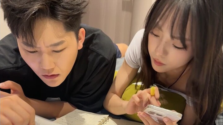 The one taking the exam is the younger brother, while the older sister is going crazy.