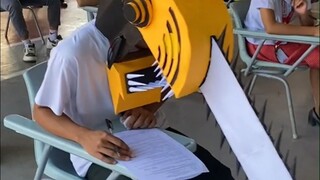 At an exam site at a university in the Philippines, candidates all wore homemade "anti-cheating hats