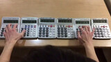 Lagu tema Detective Conan dimainkan dengan enam kalkulator