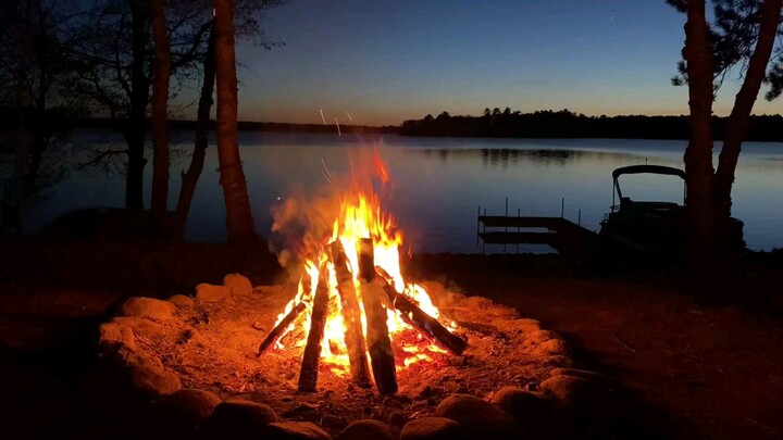 Relaxing Campfire by the River.