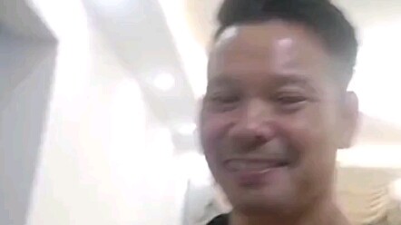 Without any help from his parents, a 50-year-old man finally owns his own home—his face beaming with