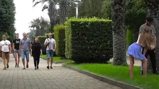 A couple fights on the roadside in broad daylight...
